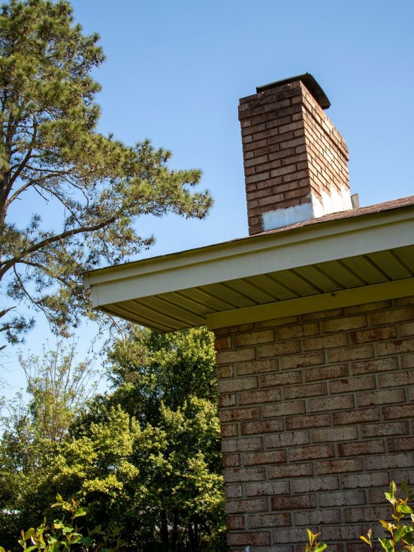 Chimney on the roof of a suburban home