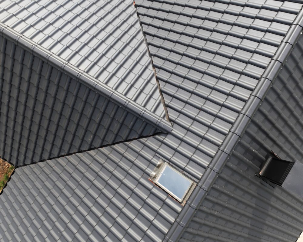 New House Roof Made From Black Roof Tiles